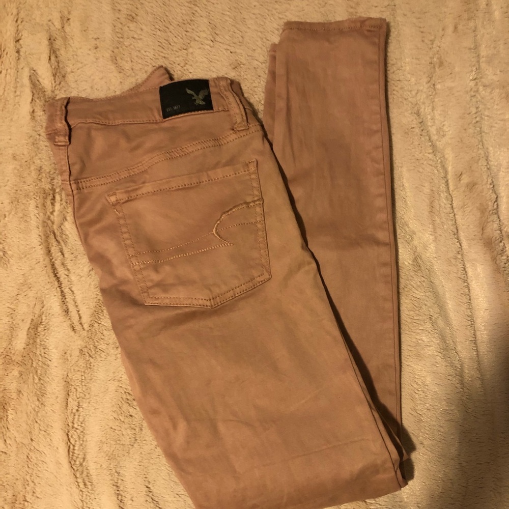 Mauve colored stretch skinny pants